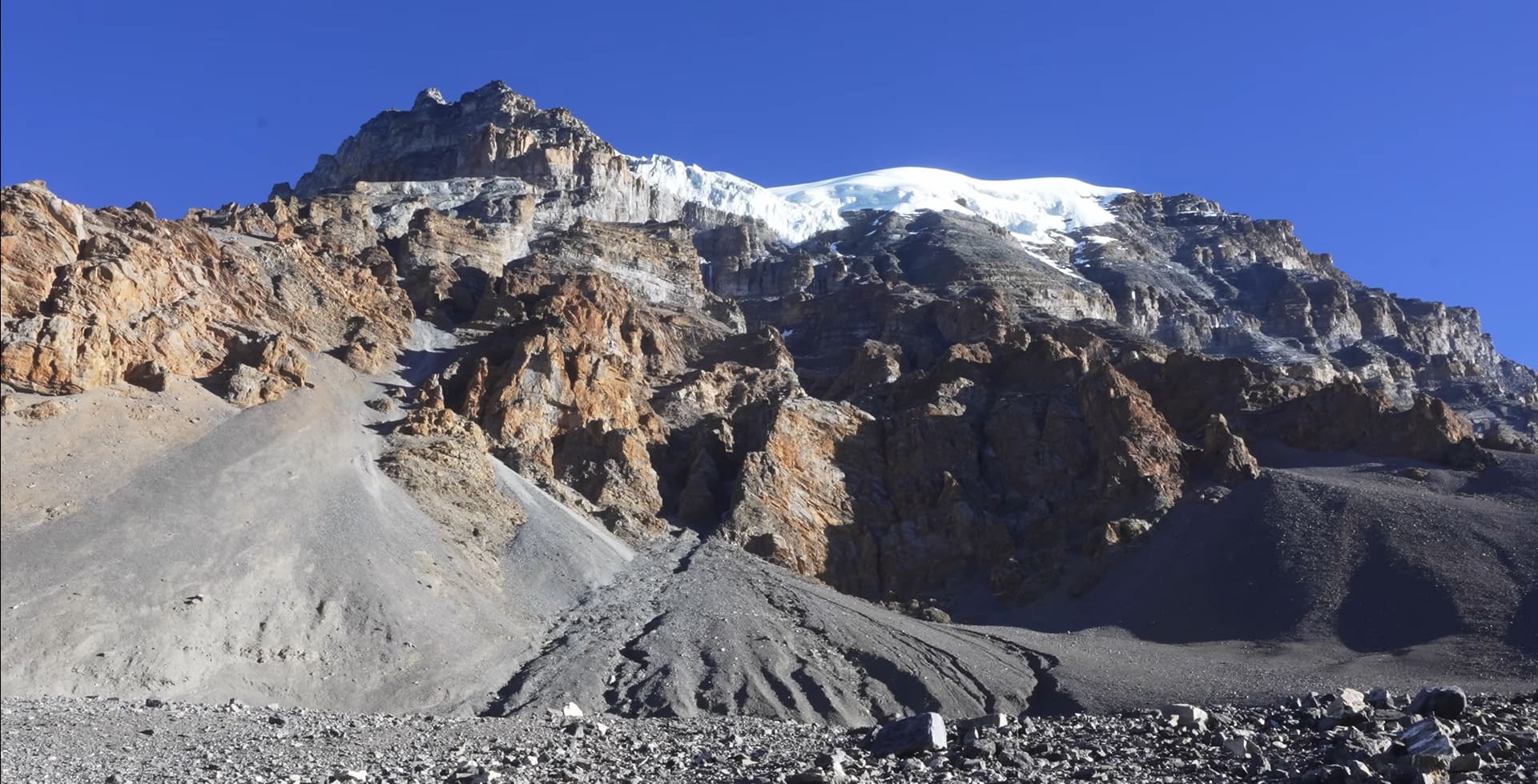 Breathtaking landscape of Thorong La Pass with rugged mountains and clear skies