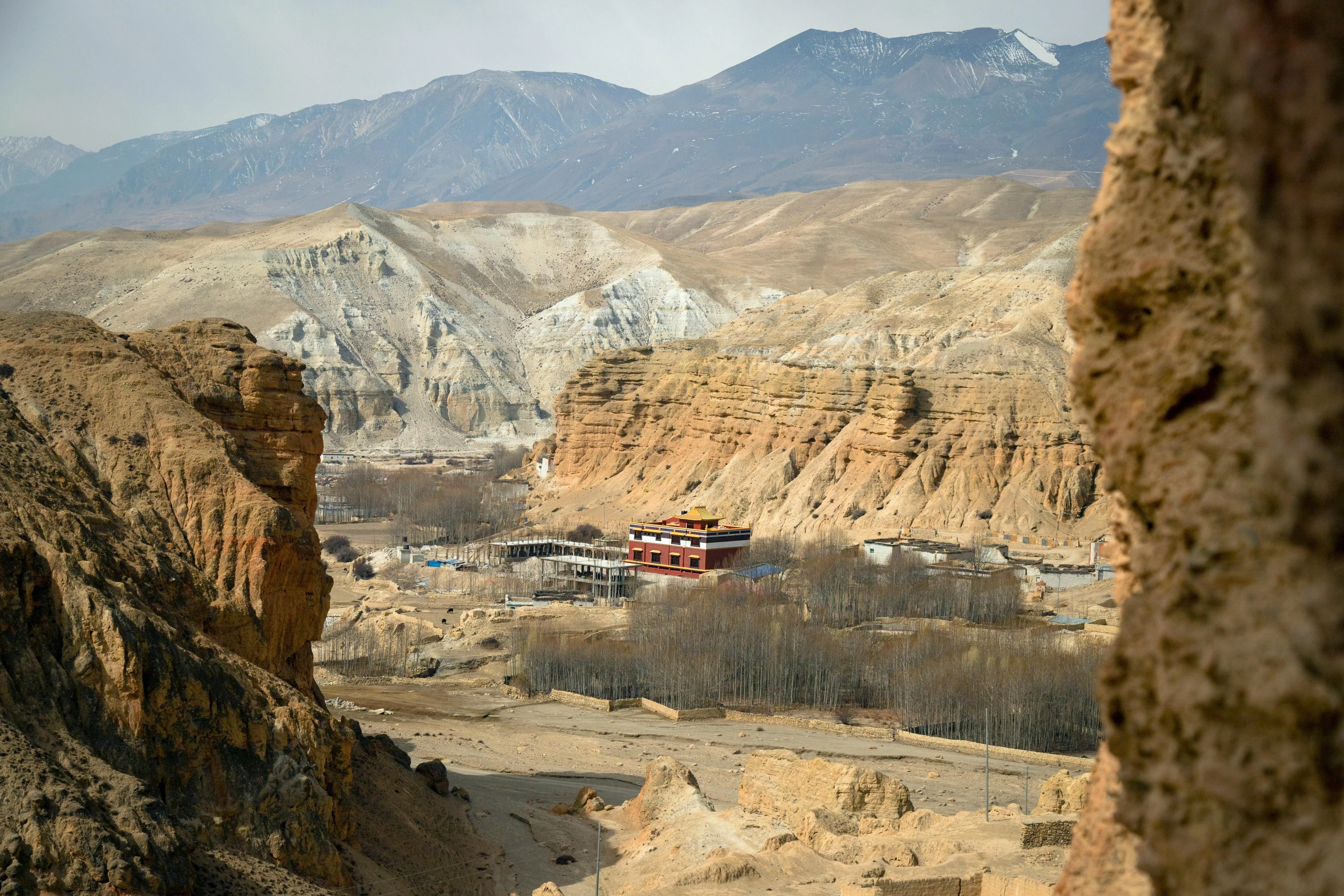 Stunning landscape of the Mustang region in Nepal, featuring rugged mountains, valleys, and traditional Himalayan scenery, captured during a Mustang tour.